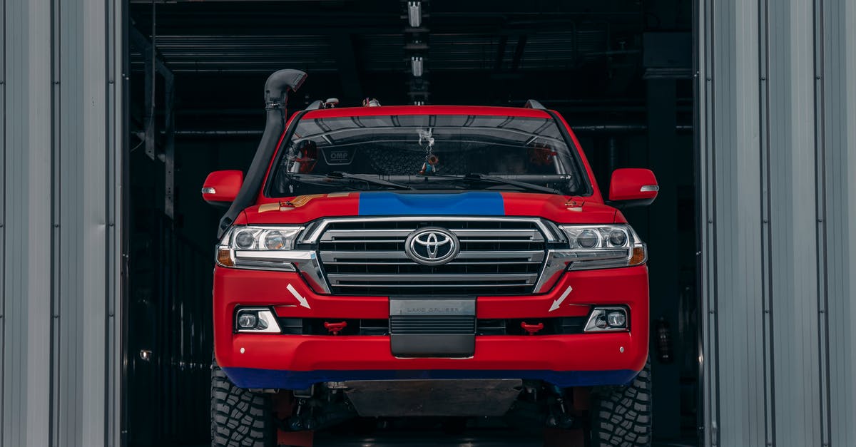 Refrigerator in garage was turned off [duplicate] - Red and Black Toyota Off-road Vehcile