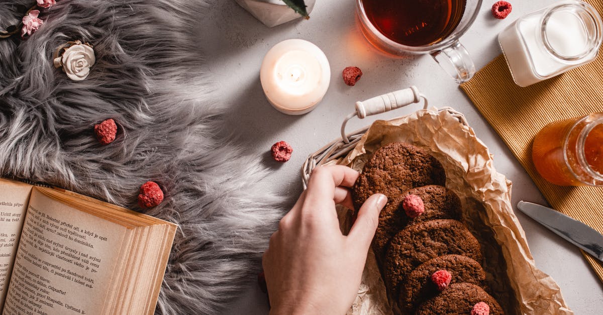 regarding chocolate chip cookies [duplicate] - Person Holding Cookies