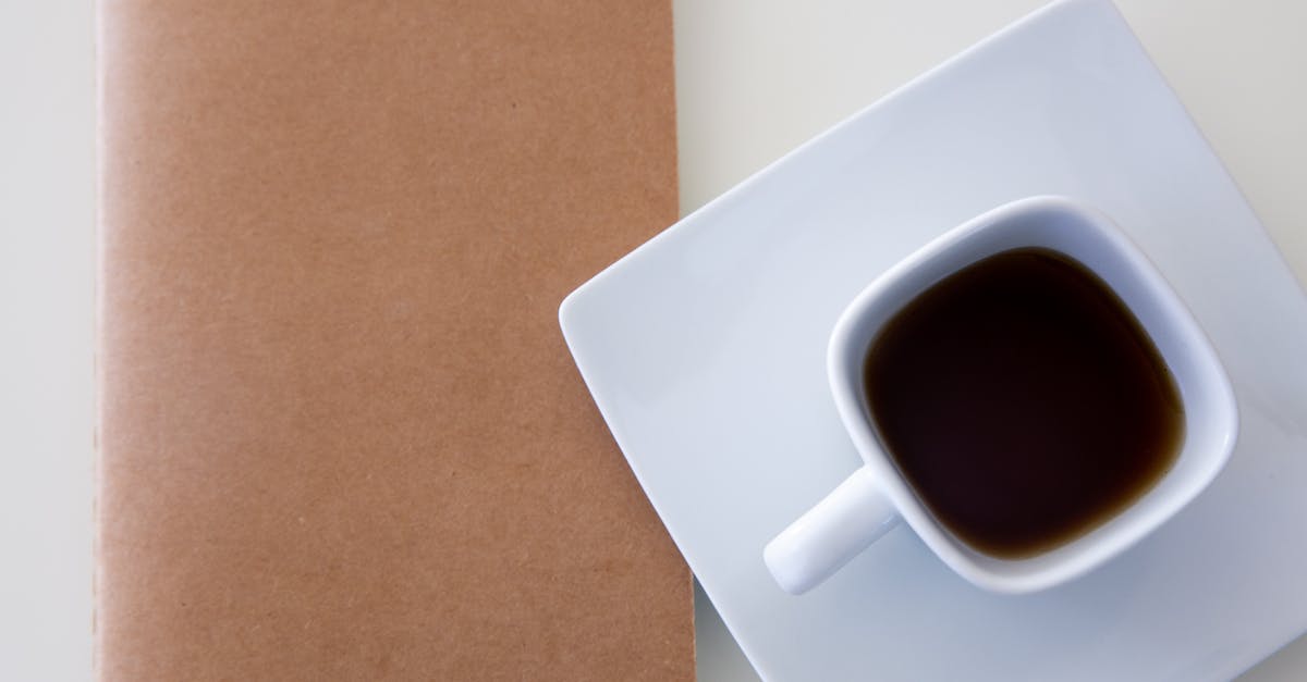 Remove tannins from tea without removing caffeine - Overhead Shot of a Ceramic Cup with Black Tea Remove tannins from tea without removing caffeine - Overhead Shot of a Ceramic Cup with Black Tea