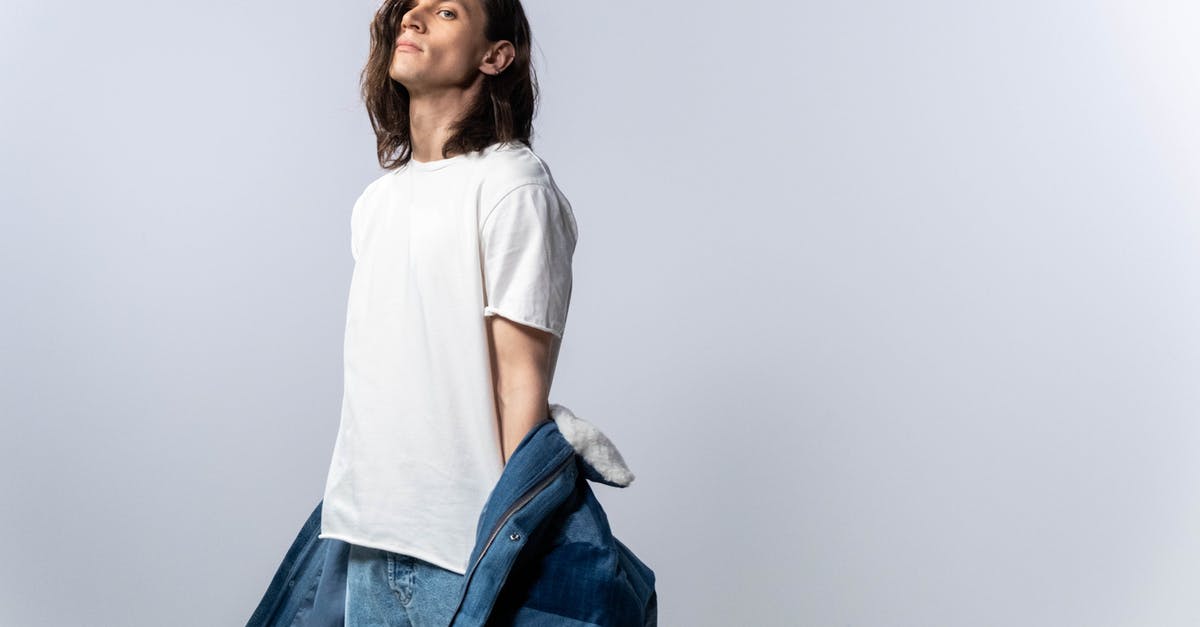 Removing long-term residue from teflon - A Man Wearing White T-Shirt Removing long-term residue from teflon - A Man Wearing White T-Shirt