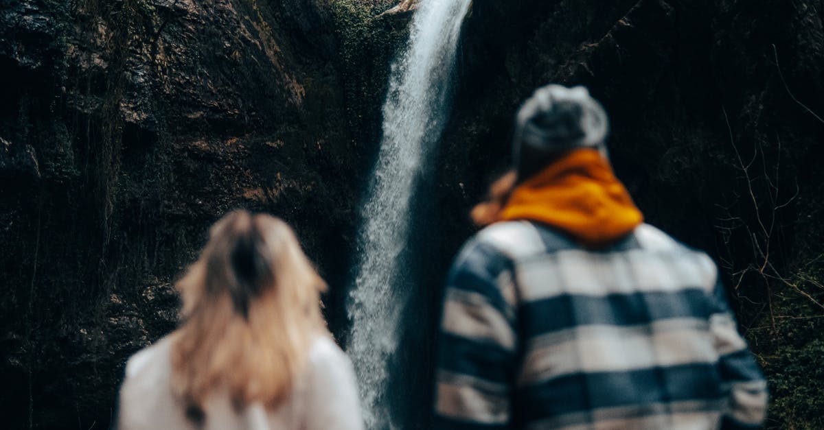 Removing long-term residue from teflon - Unrecognizable Couple Looking at Waterfall Coming from Rock Removing long-term residue from teflon - Unrecognizable Couple Looking at Waterfall Coming from Rock