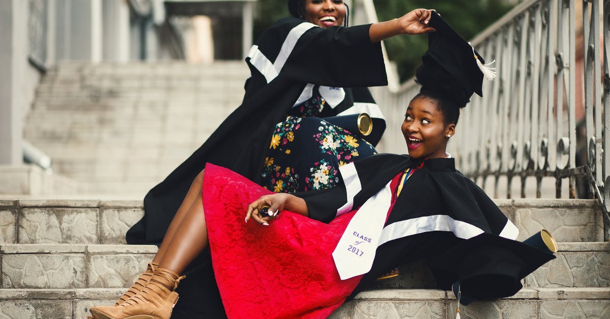 Removing ramekins from a bain marie - Shallow Focus Photography of Two Women in Academic Dress on Flight of Stairs Removing ramekins from a bain marie - Shallow Focus Photography of Two Women in Academic Dress on Flight of Stairs