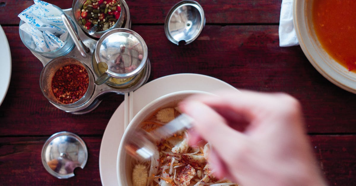 Replace cornflour in soup - Person Holding White Ceramic Bowl With Food
