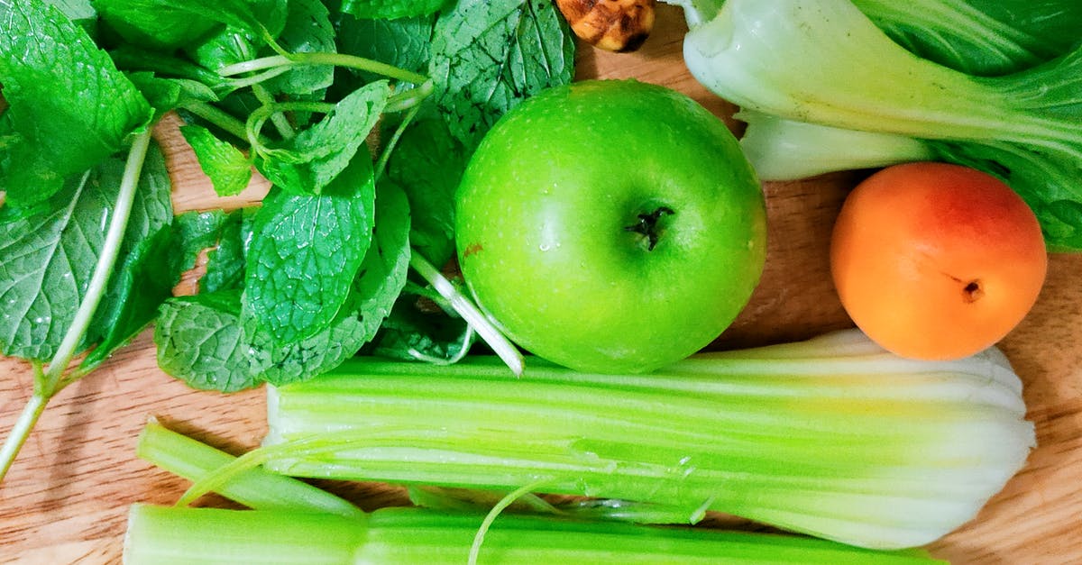 Replacement for celery with equivalent nutrients? - Top view composition of fresh organic fruits and vegetables arranged on wooden table Replacement for celery with equivalent nutrients? - Top view composition of fresh organic fruits and vegetables arranged on wooden table