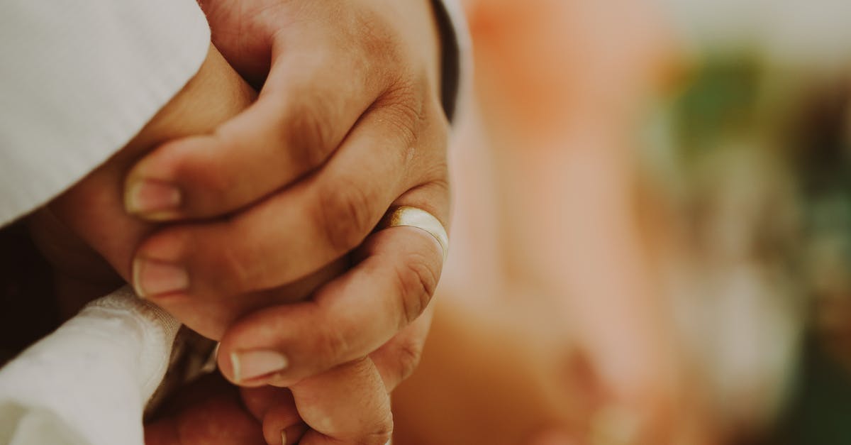 Replacement for the ring seal or gasket in a blender - Close-up Photo of a Person's Hands Together Replacement for the ring seal or gasket in a blender - Close-up Photo of a Person's Hands Together