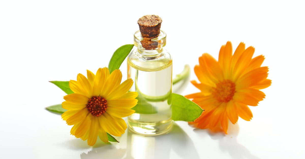 Residue in cork - Two Yellow Sunflowers With Clear Glass Bottle With Cork Lid Residue in cork - Two Yellow Sunflowers With Clear Glass Bottle With Cork Lid