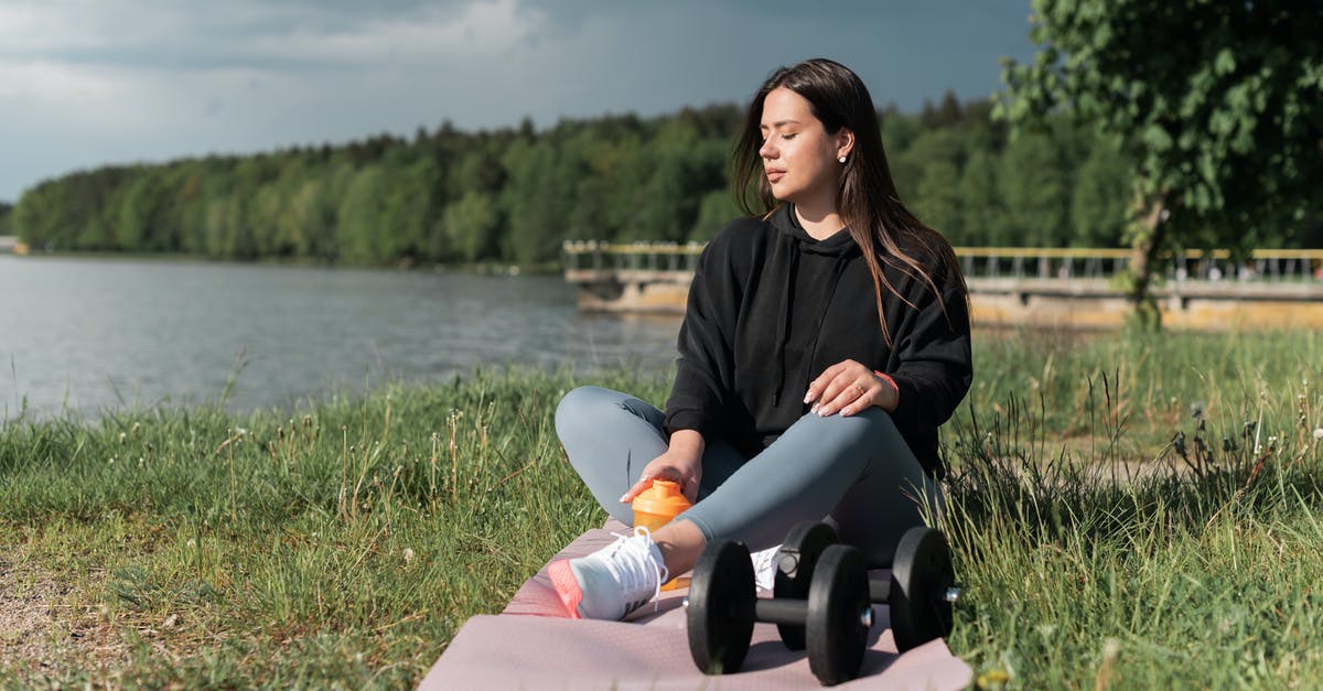 Rice flour: weight to volume - Woman in Black Jacket Sitting on Pink Textile Near Body of Water Rice flour: weight to volume - Woman in Black Jacket Sitting on Pink Textile Near Body of Water