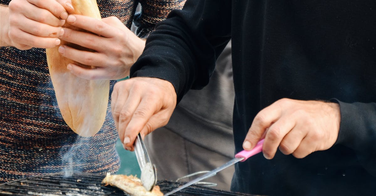 Rice pilaff preparation on bbq grill - Person Grilling Outdoors Rice pilaff preparation on bbq grill - Person Grilling Outdoors