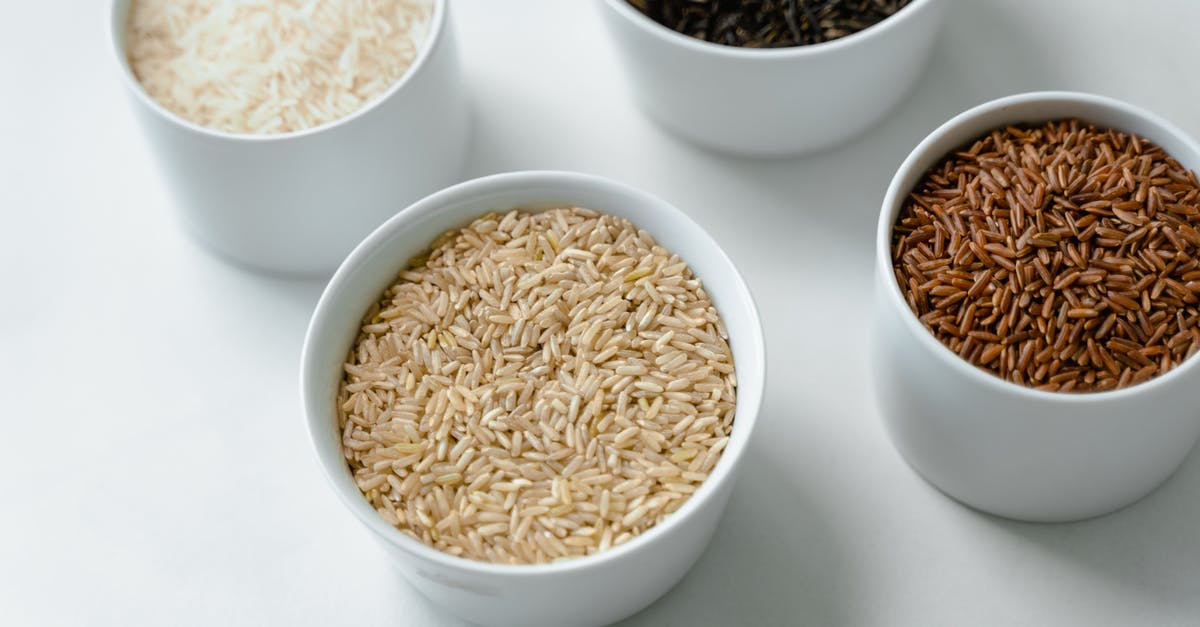 Rice Variety for Puerto Rican Rice? - Close-Up of Variety of Rice in Bowls Rice Variety for Puerto Rican Rice? - Close-Up of Variety of Rice in Bowls