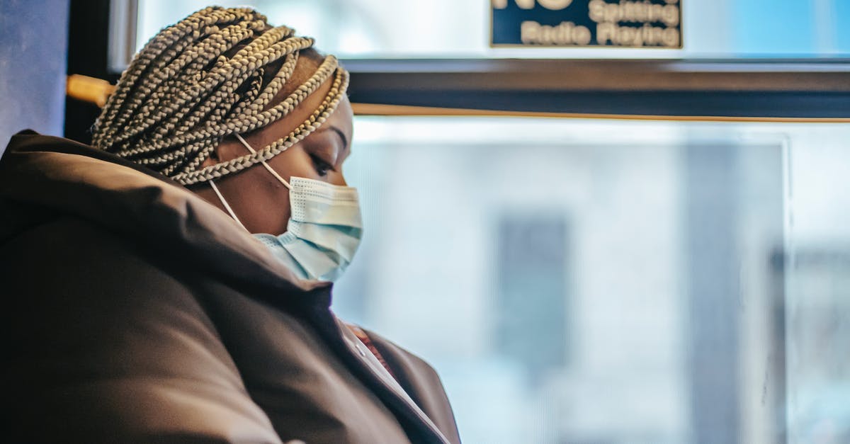 rice warming & safe - Black woman in epidemic riding in bus rice warming & safe - Black woman in epidemic riding in bus
