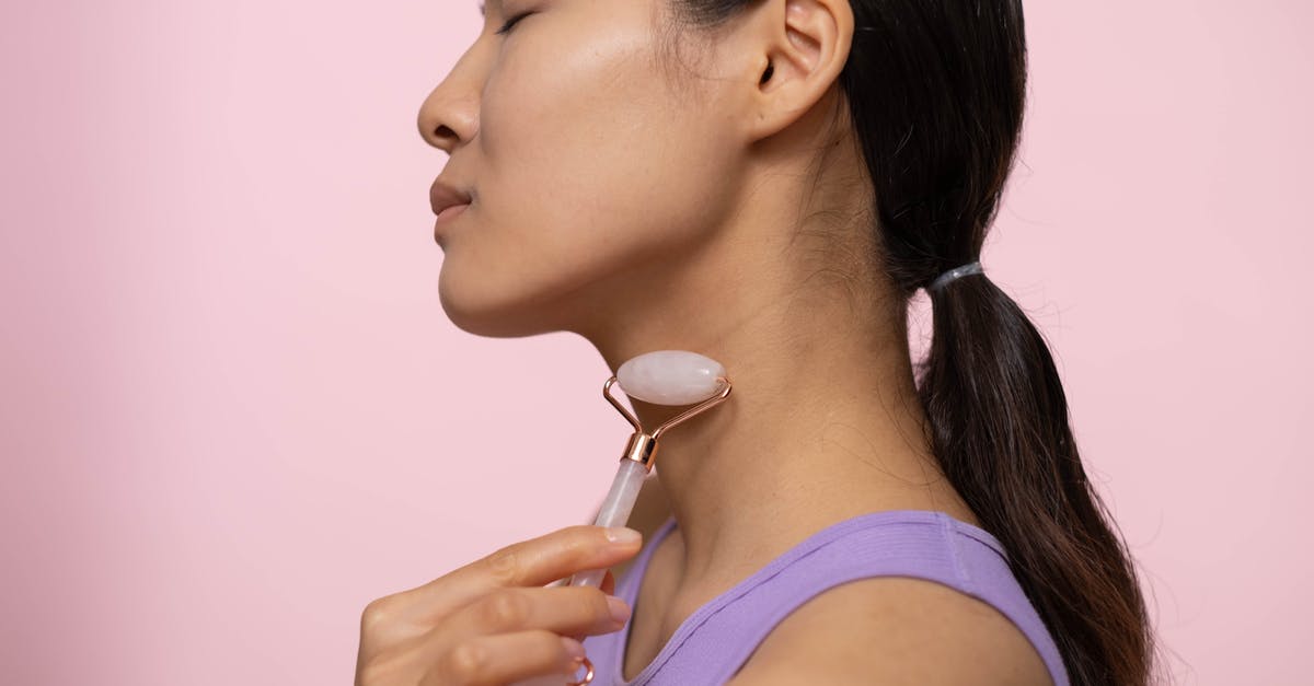 Risk of eating potato skins with anti-germination treatment - Woman in Purple Tank Top Using A Facial Roller On Neck Risk of eating potato skins with anti-germination treatment - Woman in Purple Tank Top Using A Facial Roller On Neck