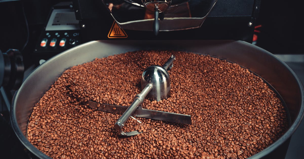 Roasting a turkey in a roaster oven - Close-up of Coffee Beans in a Coffee Roasting Machine Roasting a turkey in a roaster oven - Close-up of Coffee Beans in a Coffee Roasting Machine