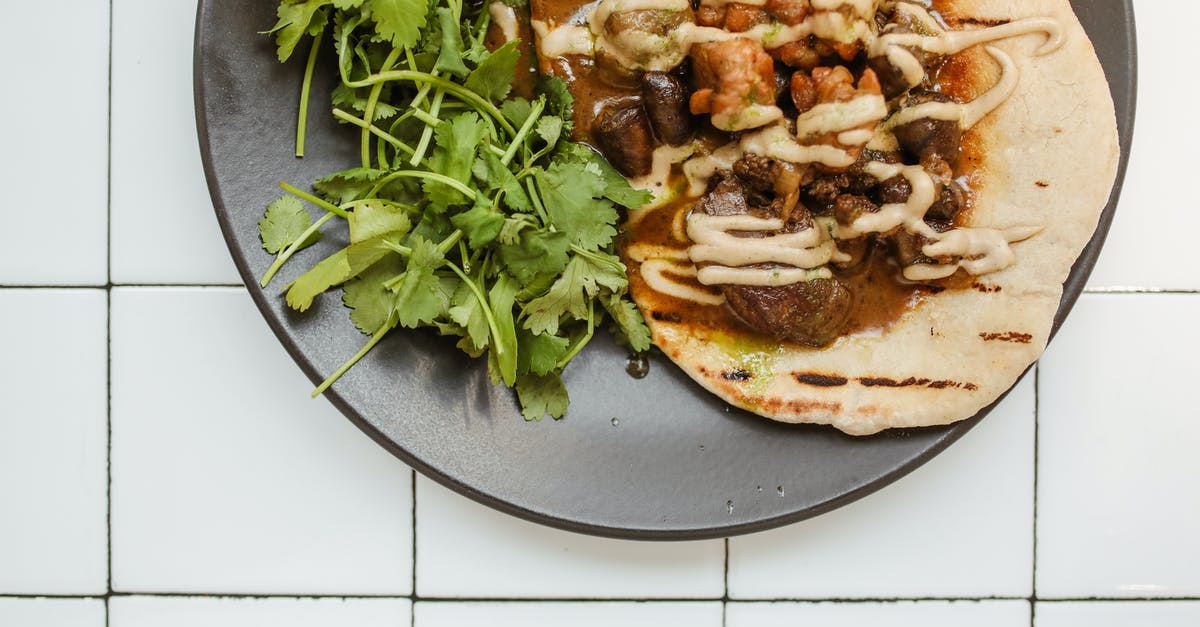 Roti Canai cooking tips? - A Curry Dish over a Roti Bread Roti Canai cooking tips? - A Curry Dish over a Roti Bread