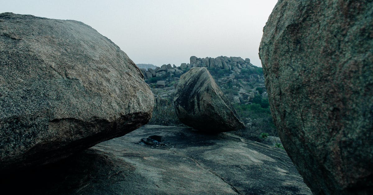 Roughly chopping large batches of hard nuts - Massive stones in mountainous area Roughly chopping large batches of hard nuts - Massive stones in mountainous area