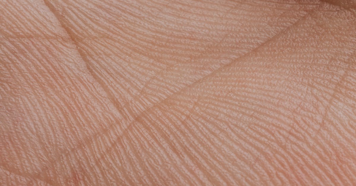 Rubber like skin on surface of chocolate mousse - Close-up View Of Human Palm Rubber like skin on surface of chocolate mousse - Close-up View Of Human Palm