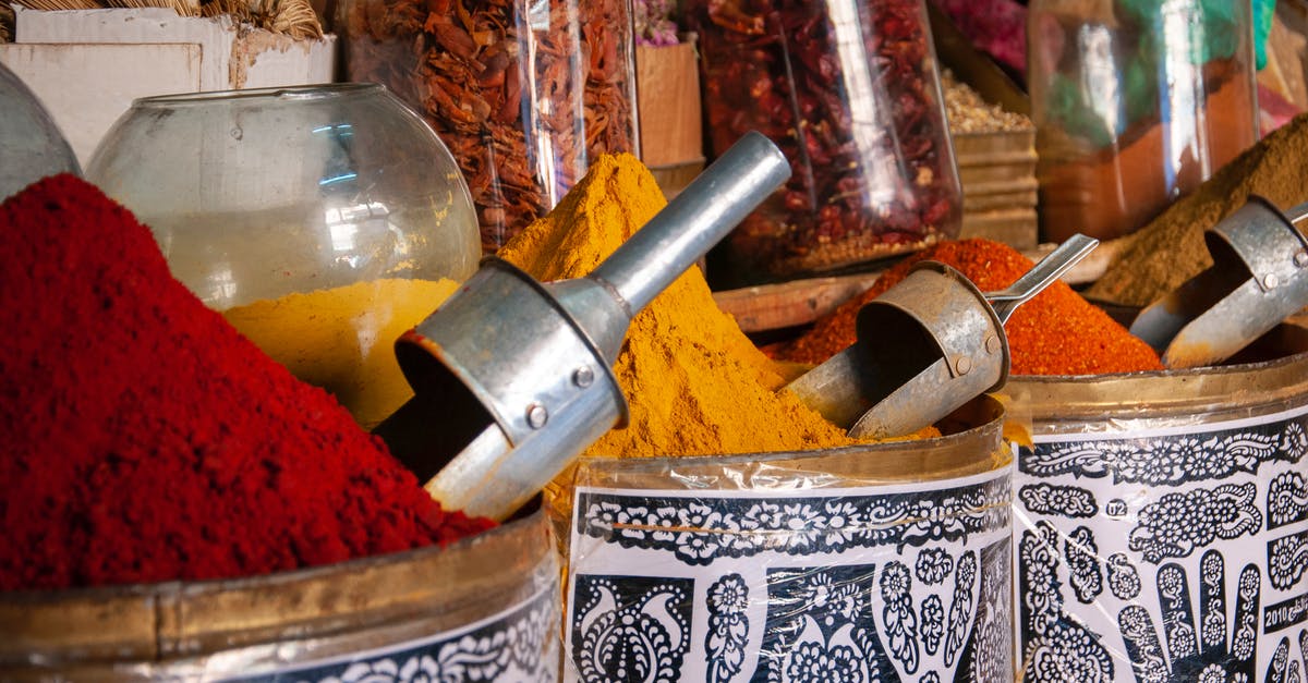 Safety of adding dried hot pepper to opened jar of pickles - Assorted aromatic condiments in traditional bazaar Safety of adding dried hot pepper to opened jar of pickles - Assorted aromatic condiments in traditional bazaar