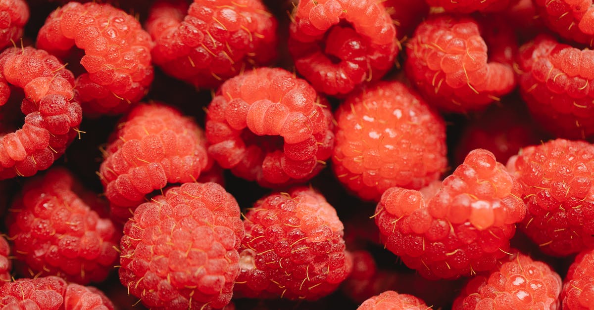 Safety of raspberry seeds in smoothies - Bunch of ripe red delicious raspberry Safety of raspberry seeds in smoothies - Bunch of ripe red delicious raspberry