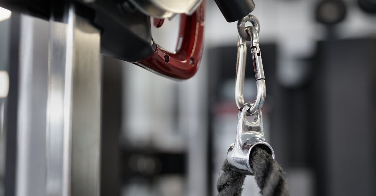 Safety Question about making stainless steel flat-top - Black rope of modern exercise machine hanging on metal carabiner Safety Question about making stainless steel flat-top - Black rope of modern exercise machine hanging on metal carabiner