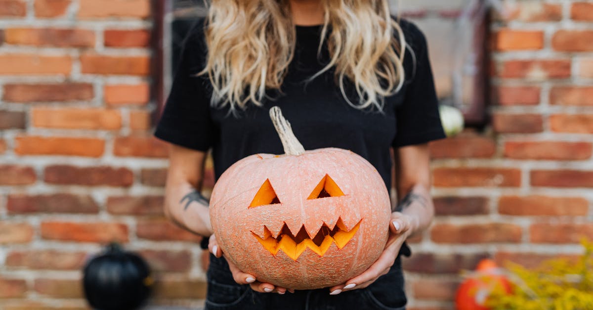 Scary moments - what temperature for broiling? - Woman in Black Crew Neck T-shirt Holding Jack O Lantern Scary moments - what temperature for broiling? - Woman in Black Crew Neck T-shirt Holding Jack O Lantern