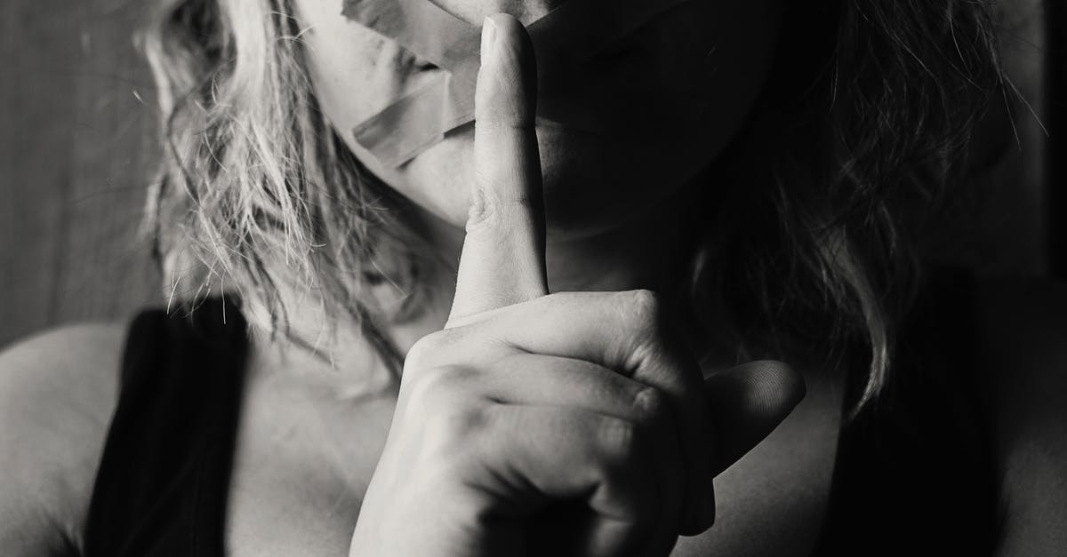 Secrets of Gumbo - Woman Placing Her Finger Between Her Lips Secrets of Gumbo - Woman Placing Her Finger Between Her Lips