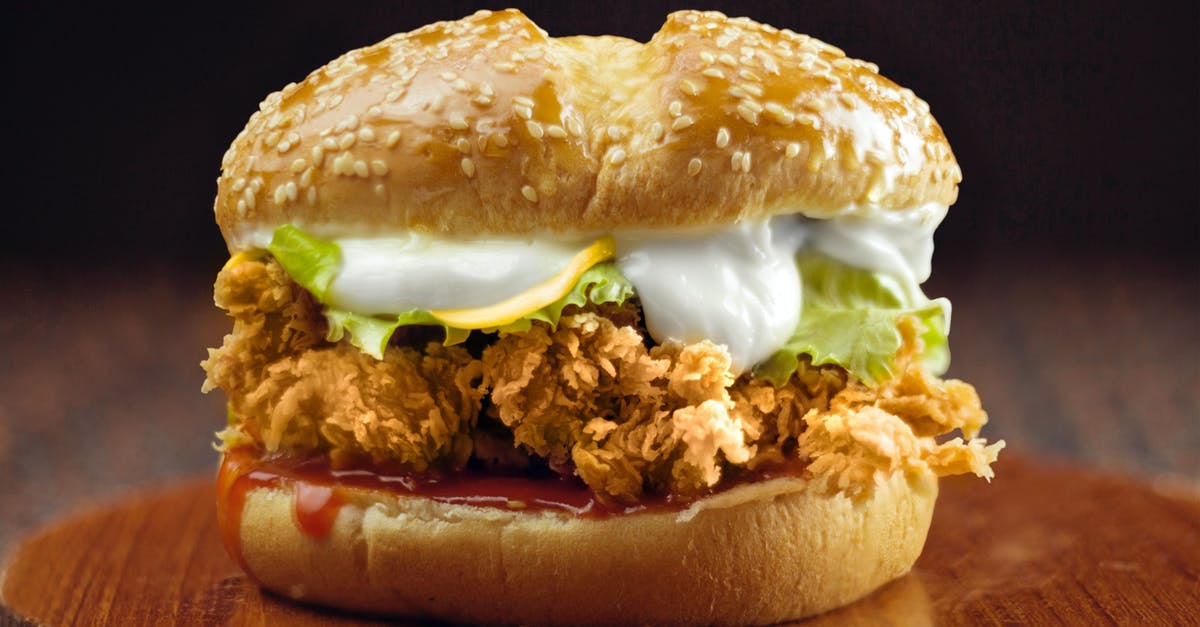 Sesame Chicken with Gravy - Close-Up Shot of a Mouth-Watering Chicken Burger