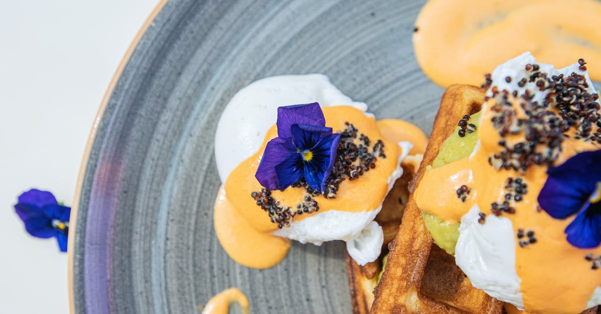 Sharpen a blue cheese dressing? - Edible Blue Flowers with Seeds on Top of Food Sharpen a blue cheese dressing? - Edible Blue Flowers with Seeds on Top of Food