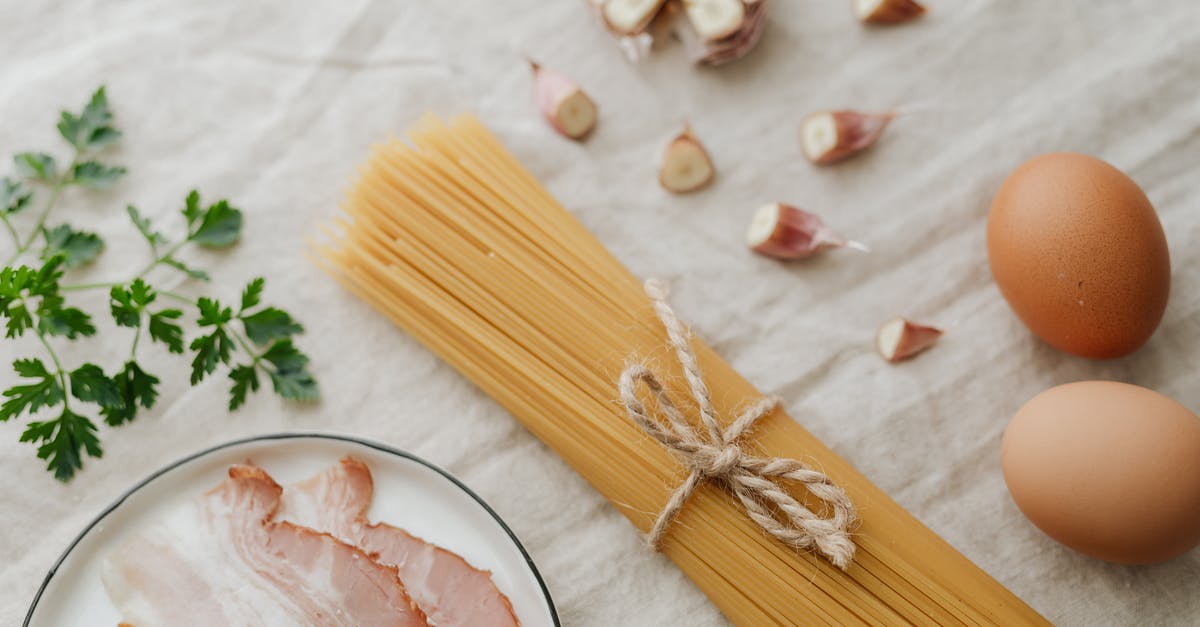 Shelf life of dried egg pasta & pasta hanger or fridge? - Photo Of Sliced Garlic Beside Pasta Shelf life of dried egg pasta & pasta hanger or fridge? - Photo Of Sliced Garlic Beside Pasta