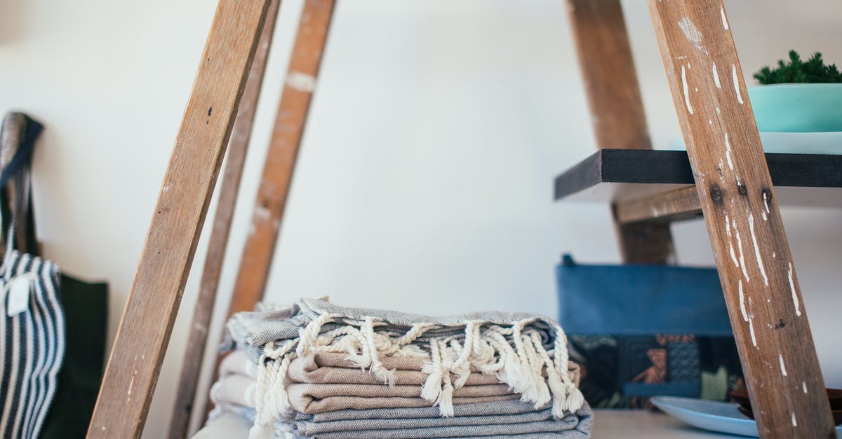 Shelf life of soft or medium boiled eggs? - Stack of clean cotton towels with tassels placed on shelf at home in daytime Shelf life of soft or medium boiled eggs? - Stack of clean cotton towels with tassels placed on shelf at home in daytime