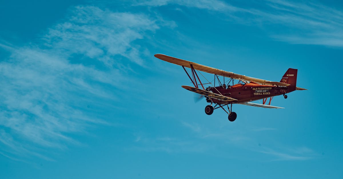 Should an Aviation include Crème de Violette? - Orange and White Airplane in Mid Air Should an Aviation include Crème de Violette? - Orange and White Airplane in Mid Air