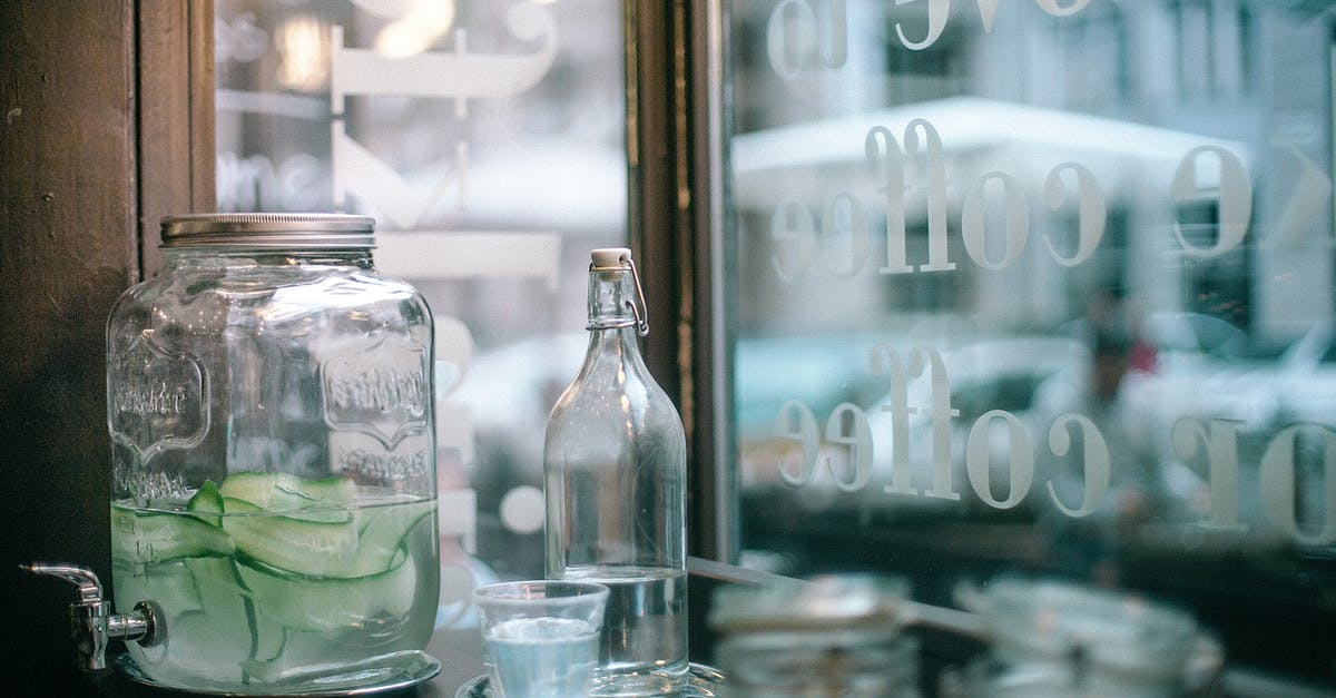 Should any liquid, or liquid-like ingredient, be included in the water proportion calculations for bread? - Glass jar of cucumber infuse water and bottle of mineral water with glass placed on wooden table with sugar jars located in urban cafeteria Should any liquid, or liquid-like ingredient, be included in the water proportion calculations for bread? - Glass jar of cucumber infuse water and bottle of mineral water with glass placed on wooden table with sugar jars located in urban cafeteria