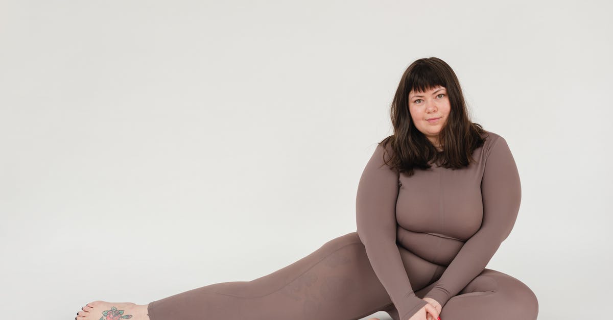 Should eggnog be chunky? - Overweight woman in activewear sitting in studio during training Should eggnog be chunky? - Overweight woman in activewear sitting in studio during training