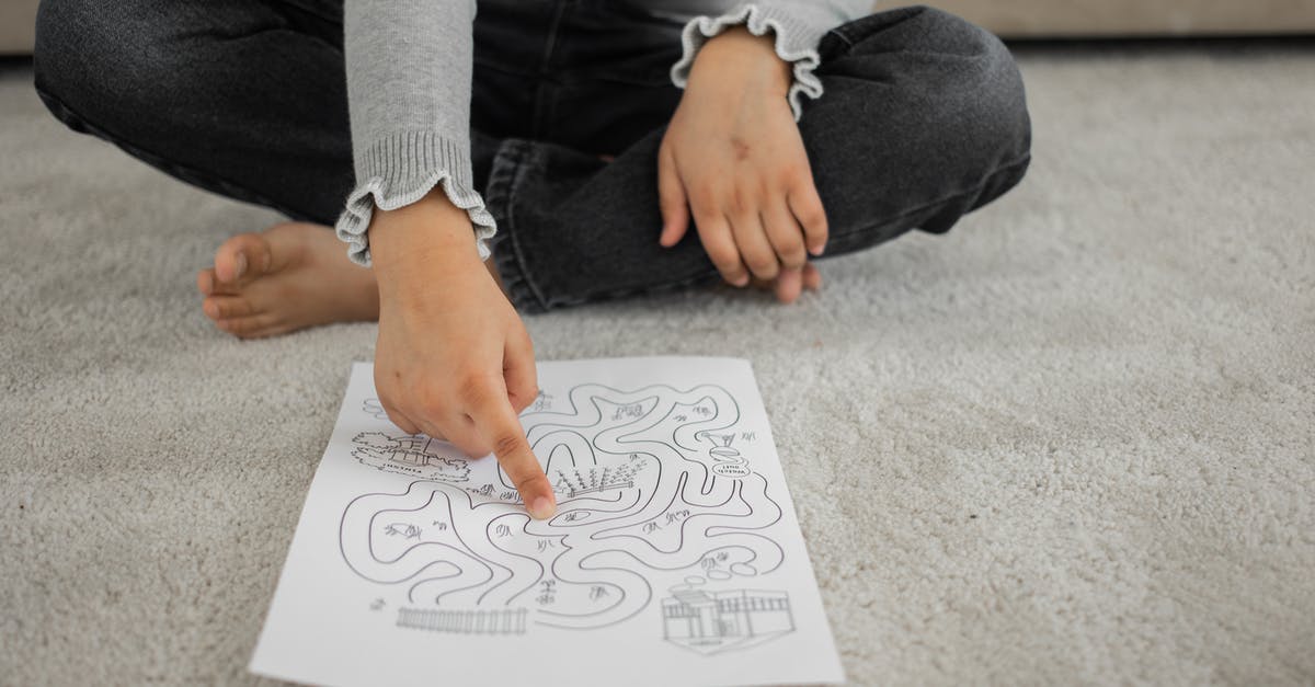 Should enriched doughs pass the windowpane test? - Crop anonymous barefooted child sitting on floor with crossed legs and solving labyrinth puzzle at home Should enriched doughs pass the windowpane test? - Crop anonymous barefooted child sitting on floor with crossed legs and solving labyrinth puzzle at home