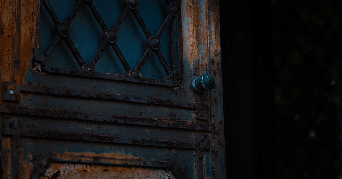 Should flour be thrown out past its expiry date? - Low angle of opened shabby metal door of derelict damaged worn out house Should flour be thrown out past its expiry date? - Low angle of opened shabby metal door of derelict damaged worn out house