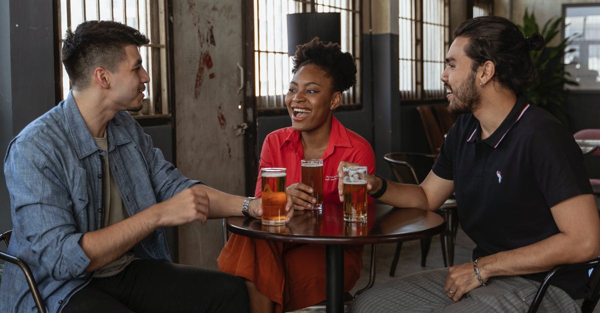Should I boil the alcohol out of marinade? - Man in Blue Denim Jacket Sitting Beside Woman in Black Shirt Should I boil the alcohol out of marinade? - Man in Blue Denim Jacket Sitting Beside Woman in Black Shirt