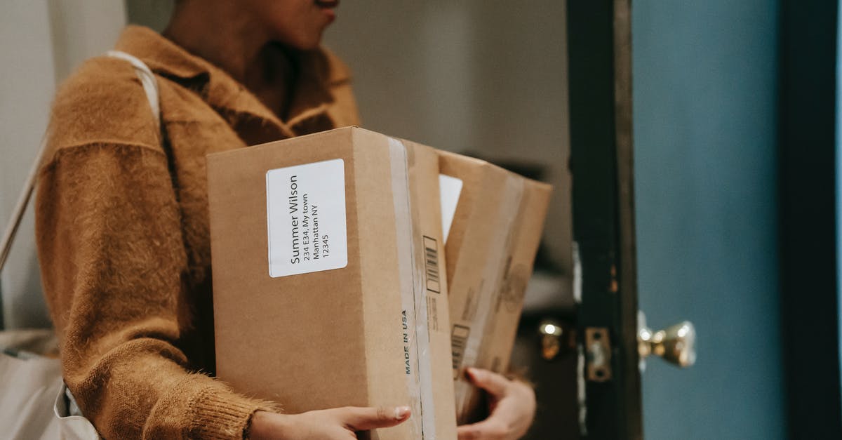 Should I buy a used flat griddle? - Crop ethnic female walking into open door of apartment with carton boxes with goods from delivery Should I buy a used flat griddle? - Crop ethnic female walking into open door of apartment with carton boxes with goods from delivery