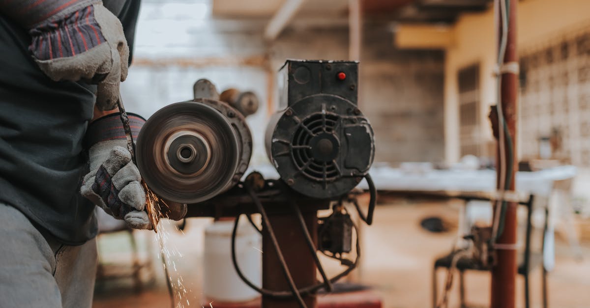 Should I maintain a carbon steel knife with oil? - Person Grinding a Tool Should I maintain a carbon steel knife with oil? - Person Grinding a Tool