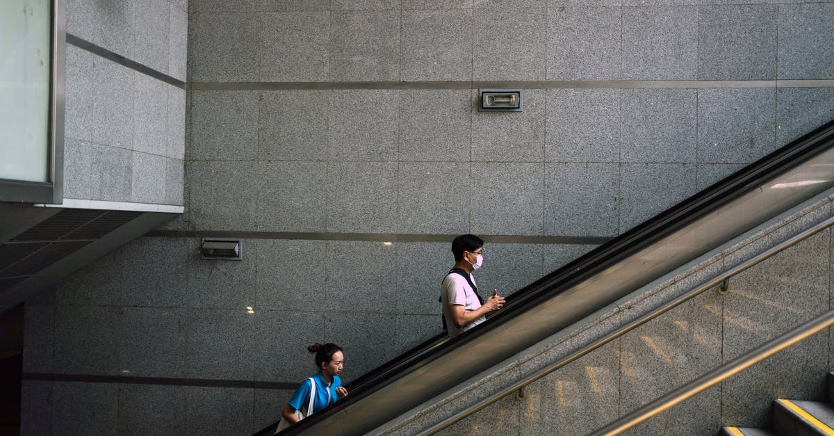 Should I sterilize new canning jars? - Anonymous man and woman on escalator during COVID 19 pandemic Should I sterilize new canning jars? - Anonymous man and woman on escalator during COVID 19 pandemic