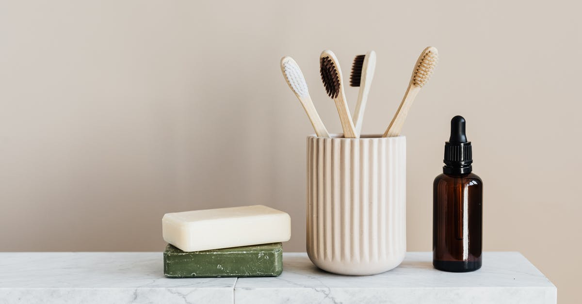 Should I wash my pre-washed greens? - Collection of organic soaps and bamboo toothbrushes in ceramic minimalism style holder placed near renewable glass bottle with essential oil on white marble tabletop against beige wall Should I wash my pre-washed greens? - Collection of organic soaps and bamboo toothbrushes in ceramic minimalism style holder placed near renewable glass bottle with essential oil on white marble tabletop against beige wall