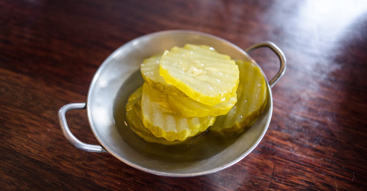 should my sour pickles be sealed while pickling? - Close-Up Photograph of Pickle Slices should my sour pickles be sealed while pickling? - Close-Up Photograph of Pickle Slices