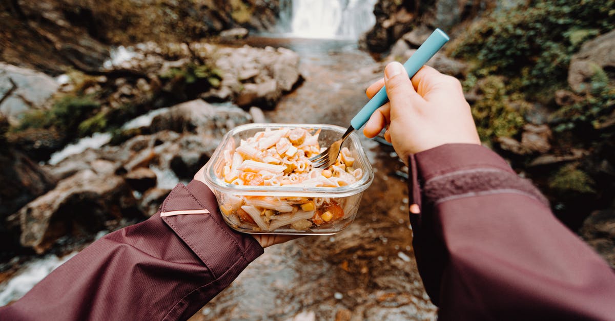 Should pasta be started in cold or boiling water? - Person Holding Fork and Glass Container with Pasta While Standing Near Waterfall Should pasta be started in cold or boiling water? - Person Holding Fork and Glass Container with Pasta While Standing Near Waterfall