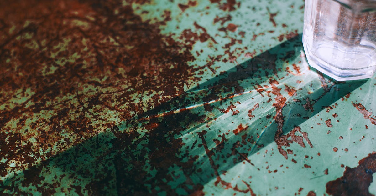 Should steaming water be used for stock/gravy? - Glass goblet on rusty corroded metal surface