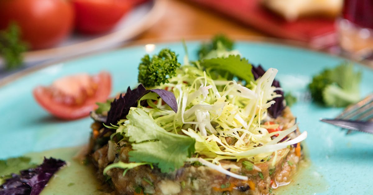 Shredded steak for south east asian dish - Green Vegetable on White Ceramic Plate Shredded steak for south east asian dish - Green Vegetable on White Ceramic Plate