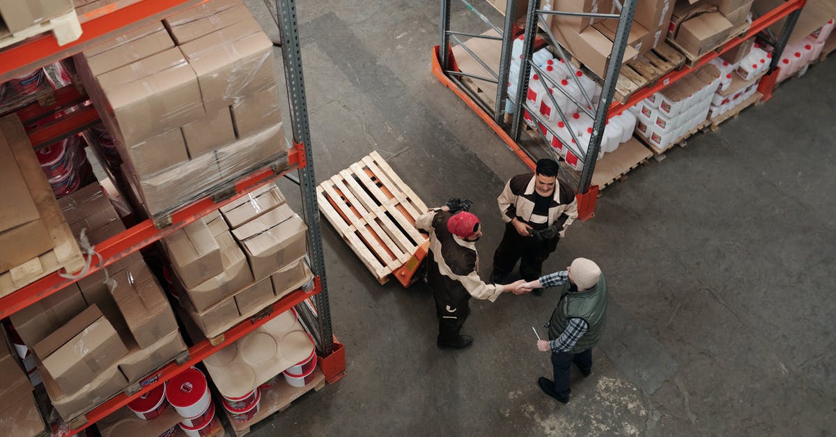 Silicone molds: transportation and storage - Men Working in a Warehouse