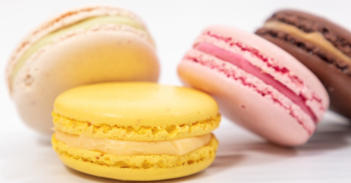Simple Puff Pastry Dough - Multi colored macaroons on white table Simple Puff Pastry Dough - Multi colored macaroons on white table