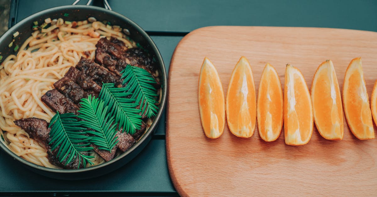 Slow cook beef brisket slices method - Photo of Noodles on Pan Near Wooden Chopping Board With Oranges Slow cook beef brisket slices method - Photo of Noodles on Pan Near Wooden Chopping Board With Oranges