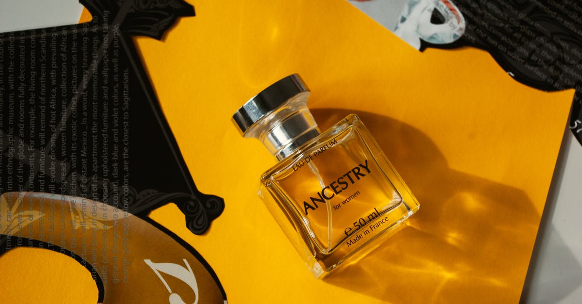 Slow cooker lid gasket smell - Top view of bottle of perfume placed on yellow surface near magazine clippings in daylight Slow cooker lid gasket smell - Top view of bottle of perfume placed on yellow surface near magazine clippings in daylight