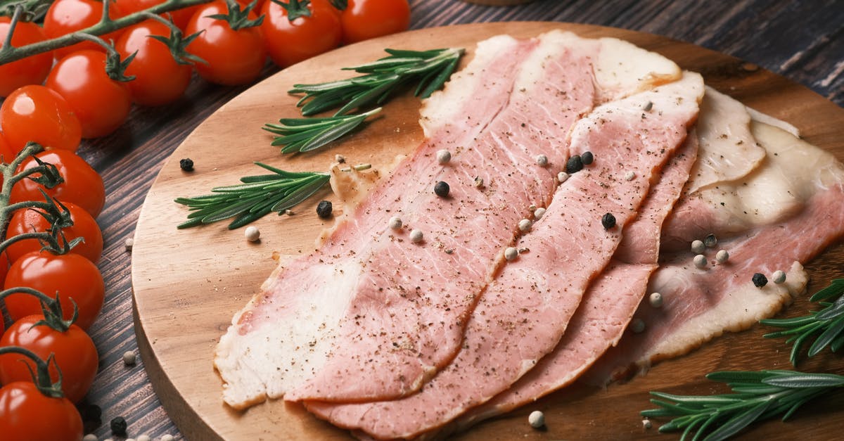 Smoked ham roast: what do I do with it? - Raw Meat on Brown Wooden Chopping Board Smoked ham roast: what do I do with it? - Raw Meat on Brown Wooden Chopping Board