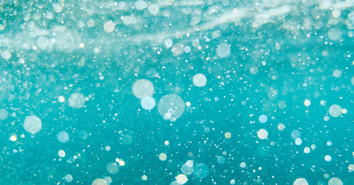 Smoothie - water as base liquid, originally? - Close-up of Water Bubbles Splashing Smoothie - water as base liquid, originally? - Close-up of Water Bubbles Splashing