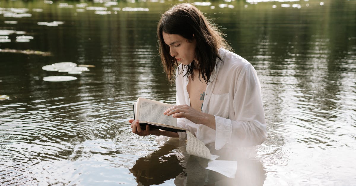 Soaking beef in water - A Tattooed Man in White Long Sleeves Soaking on the Lake while Reading a Book Soaking beef in water - A Tattooed Man in White Long Sleeves Soaking on the Lake while Reading a Book