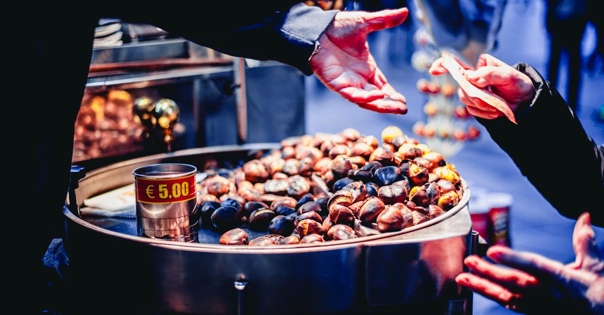Soaking legumes and cooking another day - Person Paying Bill in Front of Nuts Soaking legumes and cooking another day - Person Paying Bill in Front of Nuts